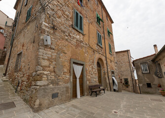 Fototapeta na wymiar One of the most beautiful villages in Tuscany, Campiglia Marittima develops within the historic walls, the buildings are arranged in concentric semicircles and create a particular harmony that distin