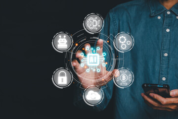 Artificial Intelligence AI, Person hand holding holographic brain Artificial Intelligence (AI) icon from the screen, Internet of Things IoT concept.