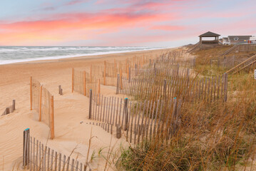 Beautiful sunrise at Nags Head beach, Outer Banks, North Carolina, USA.  Nags Head is one of the...