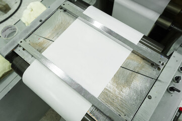 Paper web feeding and alignment unit in a roll rotary flexographic printing machine. Equipment for...