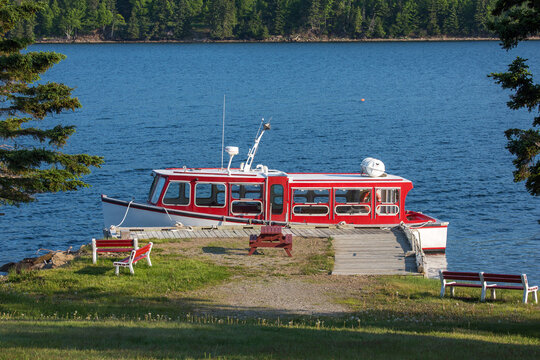 Sight seeing birdwatching tour boat docked at base along Cabot Trail at Englishtown, Cape Breton, Nova Scotia, Canada.  