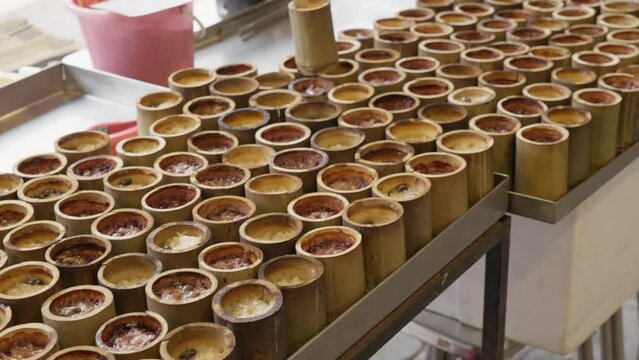 Top view of the glutinous sticky rice roasted in bamboo joints, a popular Thai dessert from Nong Mon market in Sri Racha, Thailand