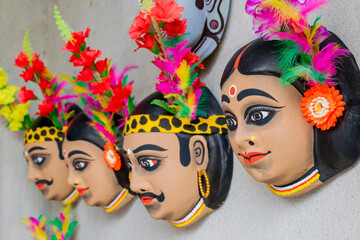 Colorful Chhau (or chhou) masks of santal tribes , handicrafts on display for sale - at Charida,...