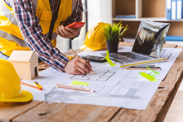 Architects and engineer create architectural works from their blueprints construction models for...