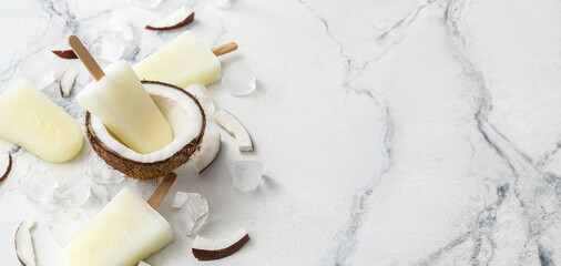 Tasty coconut ice cream on light background with space for text