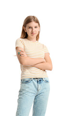 Pretty teenage girl in striped t-shirt on white background