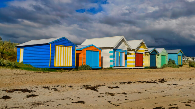 Row of Very Colourful Beach Huts at Safety Beach