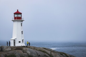 Fototapeta na wymiar lighthouse on the coast Peggy's Cove