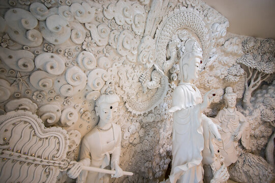 Chiang Rai Province,Northern Thailand on January 19,2020:Magnificent stucco decorations at the top floor of Guan Yin statue,Wat Huay Pla Kang.(selective focus)