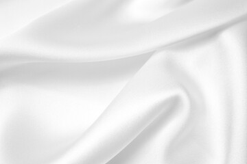 Obraz premium Smooth elegant white silk or satin luxury cloth texture can use as wedding background. Luxurious Christmas background or New Year background design