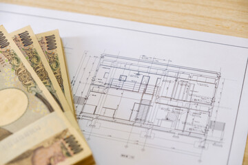 建築図面と現金　設計図　新築