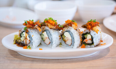 set of fresh sushi rolls with eel, Japanese food.