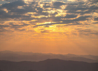 Fototapeta na wymiar Sunrise sky at Doi Samer Dao,Sri Nan National Park,Na Noi,Nan province,Northern Thailand.(selective focus)