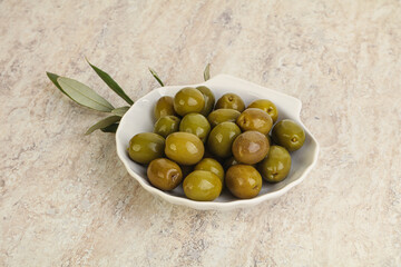 Tasty marinated olives in the bowl