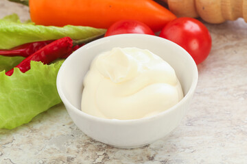 Organic mayonnaise sauce in the bowl