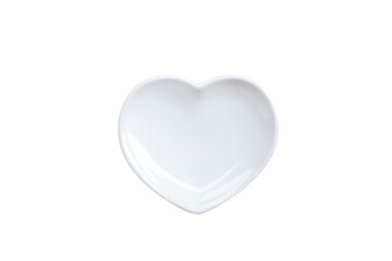 Empty white heart plate isolated on white background.