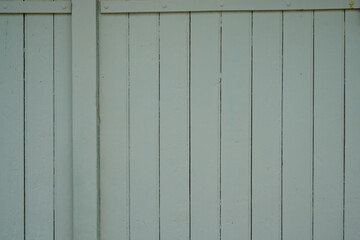 green wooden planks background old ancient fence wood vertical plank panel