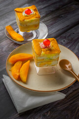 Mango mousse on a plate with copy space