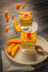 Mango mousse on a plate with copy space