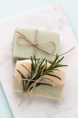 Handmade natural soap on pastel background.