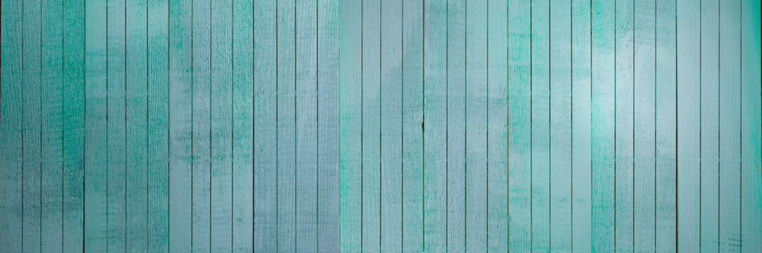 Light blue wood background - Aquamarine planks with peeling paint in vertical wood - Turquoise wooden surface - Very high resolution