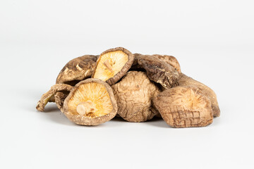 dried shiitake mushrooms on white background