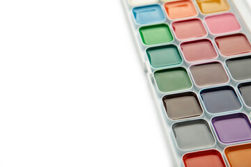 Watercolor paints in box isolated on white background with clipping path