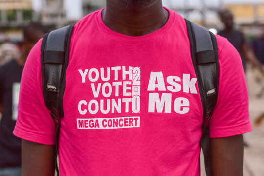 A Man Wearing A Pink Shirt During Youth Vote Count Mega Concert