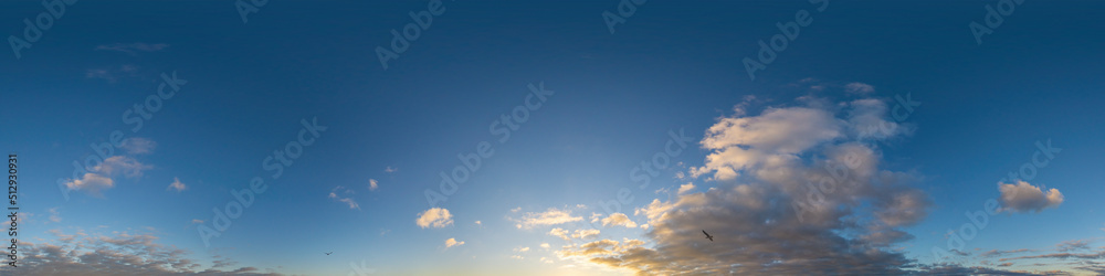 Wall mural panorama of a dark blue sunset sky with golden cumulus clouds. seamless hdr 360 panorama in spherica