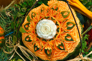 decorated pumpkin. carvings in a decorative pumpkin. Harvest festival. Craftsmanship