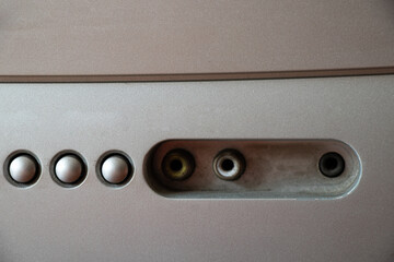 Buttons on an old gray TV close-up, watch TV, on and off buttons
