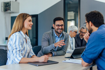 Obraz premium Group of people, having a meeting, planning their next project