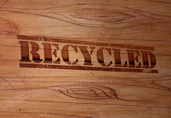 Recycled Stamp on a Wooden Surface