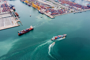 container cargo ship sailing in green sea to transport of goods import export internationally or...