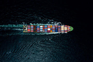 container cargo ship sailing full speed in pacific ocean to transport goods import export...
