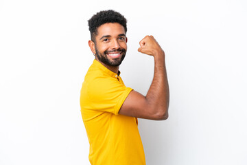 Young Brazilian man isolated on white background doing strong gesture