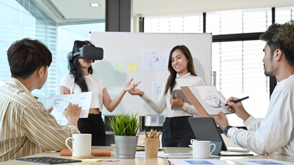 Business team brainstorming and working on virtual reality applications for improvement future technology of business