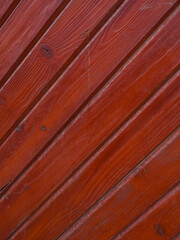 Vertical image of old boards with red paint. Wood texture background nature background wallpaper vintage retro old style decor design popular. A wooden door. 