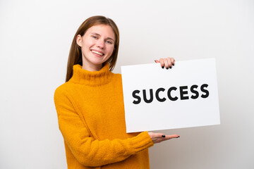 Young English woman isolated on white background holding a placard with text SUCCESS with happy expression
