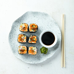 Assorted vegan sushi rolls with vegetables and tofu