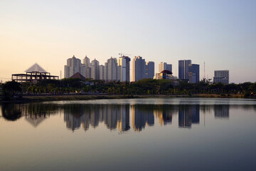West Surabaya cityscape view with reflections, Surabaya city, Indonesia