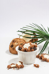 Fototapeta na wymiar Gluten-free and lactose-free coconut cookies. Homemade healthy pastries, green tea, sunny morning
