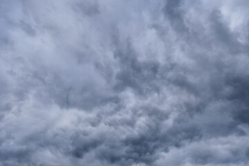 Abstract, dramatic background dark storm clouds.