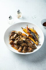 Homemade meat ragout with roasted carrots