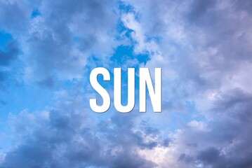 Fototapeta premium SUN - word on the background of the sky with clouds.