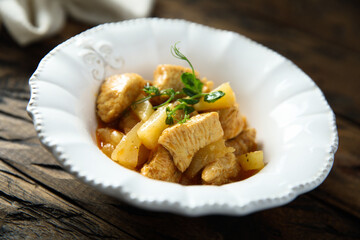 Braised turkey meat with pineapple