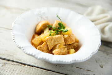 Braised turkey meat with pineapple