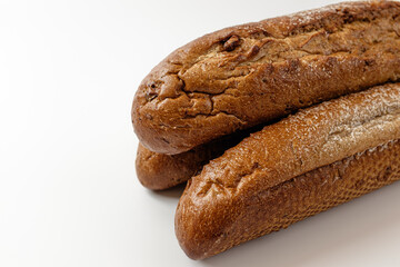 whole grain baguette on a white background