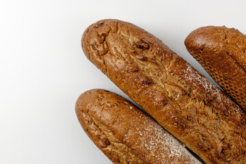 whole grain baguette on a white background