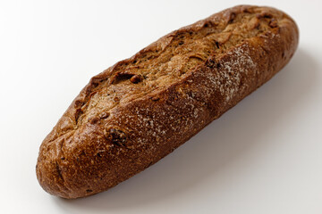 whole grain baguette on a white background